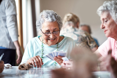 Elderly ladies playing cards