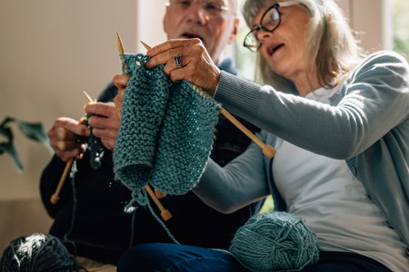Care home residents knitting